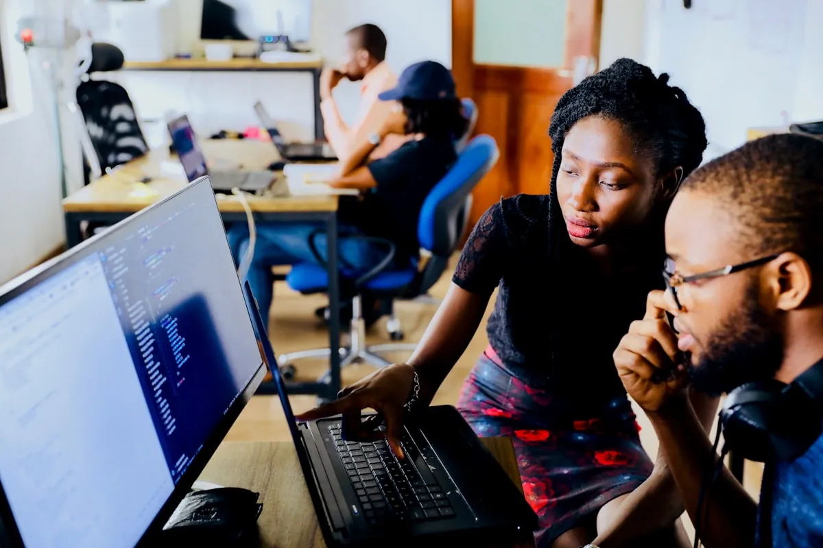 A team working together inside their operations system on screen