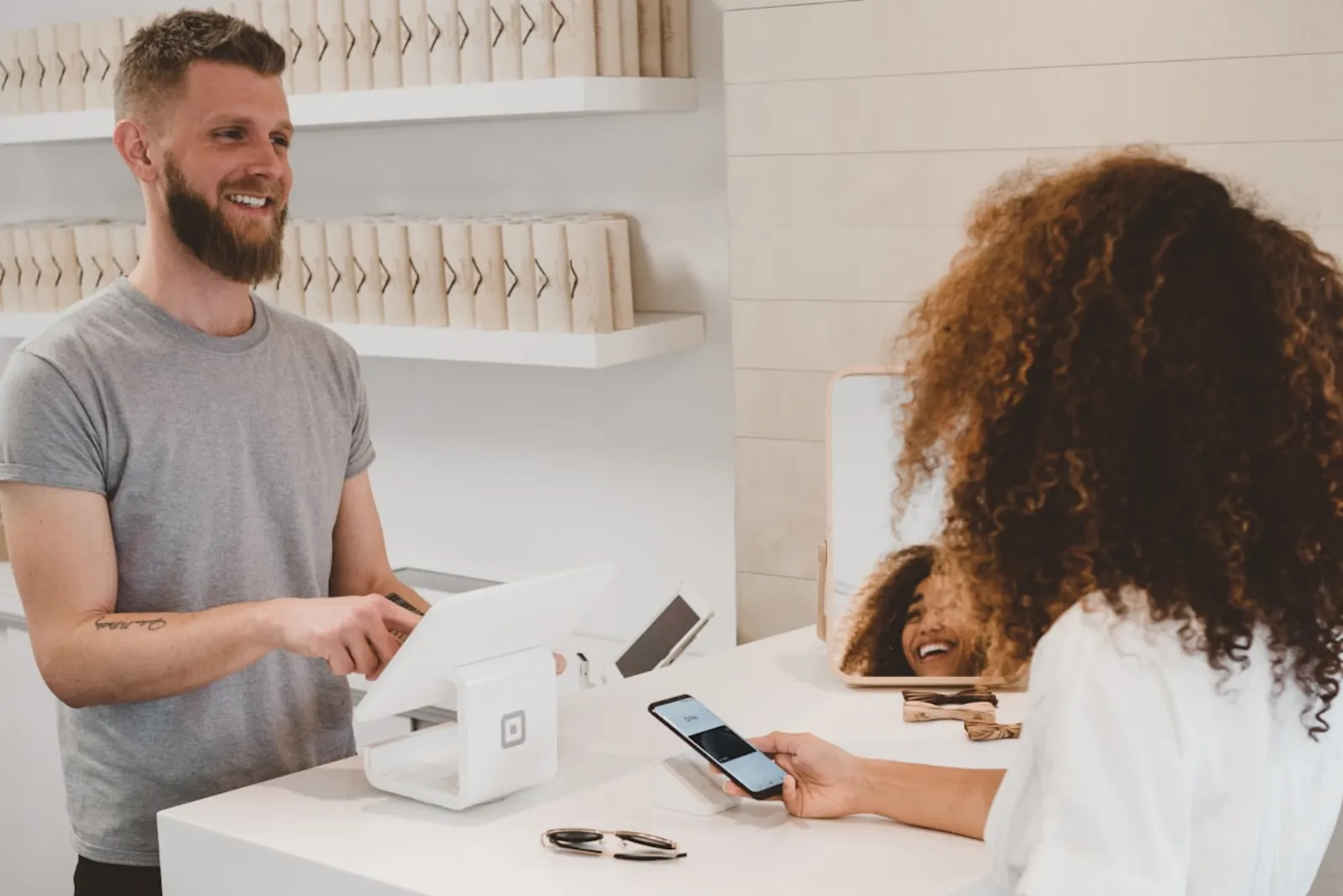 A local business taking a customer payment — the inquiry a website is built to produce